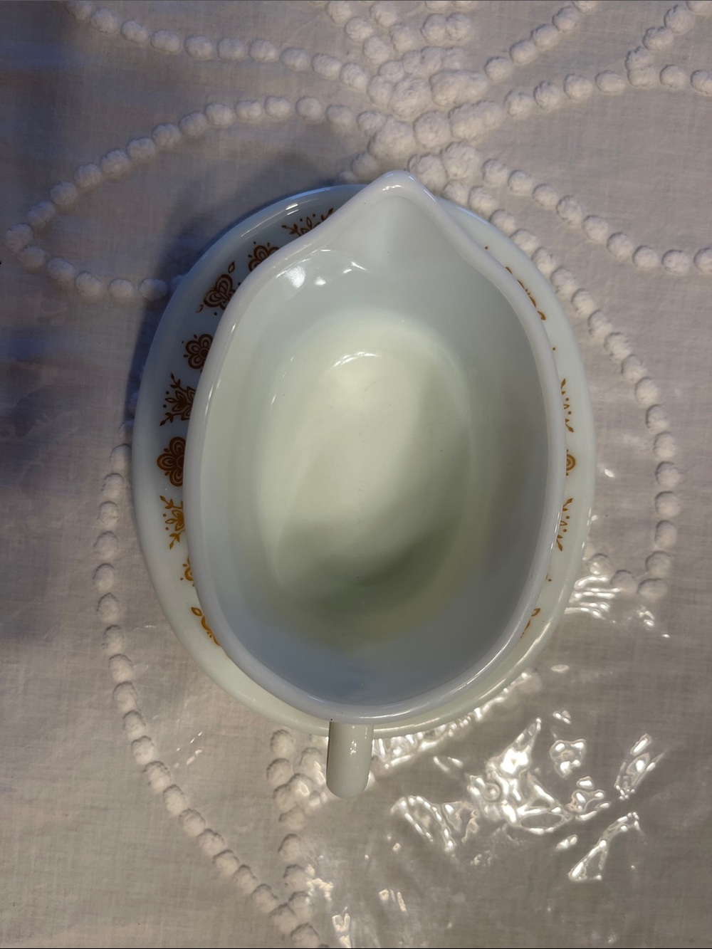 Pyrex White Creamer and Saucer with Gold Floral Pattern - Picture 3 of 7